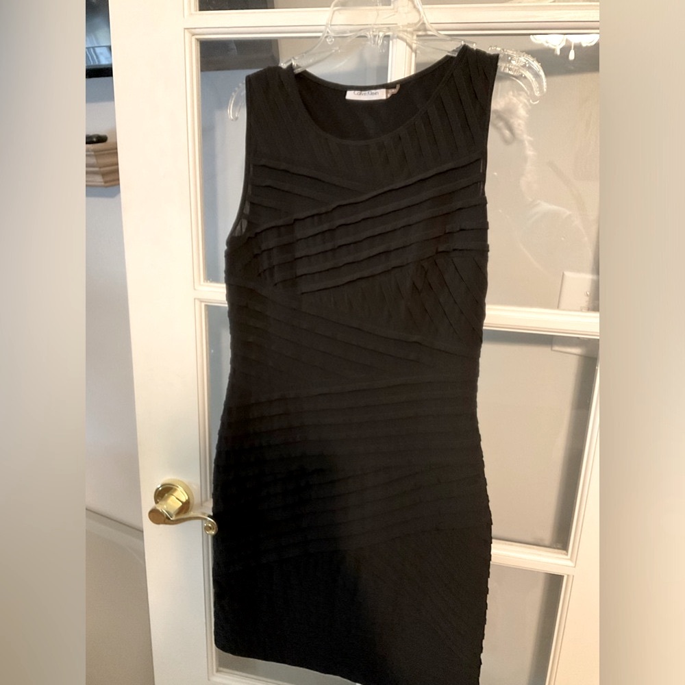 Calvin Klein black Body dress Size 6. Excellent condition.